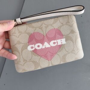 Coach Beige Wristlet with Pink Heart